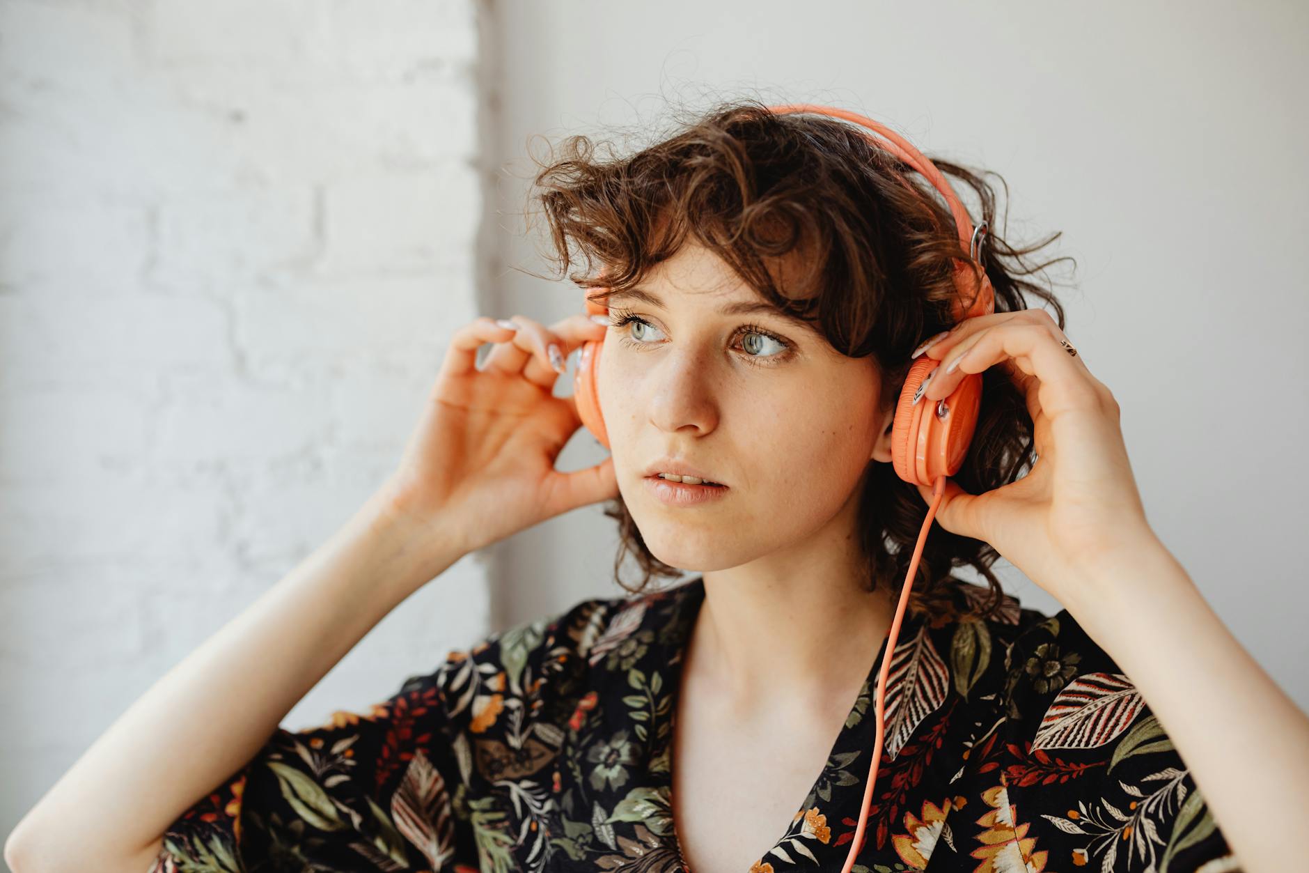 person listening to headphones nature