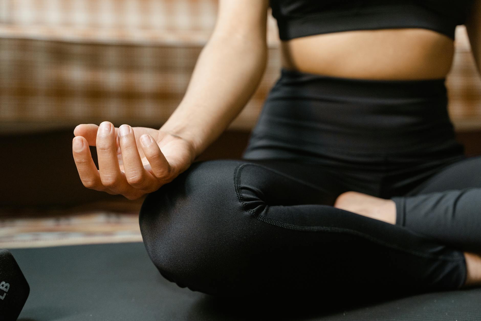 person meditating nature