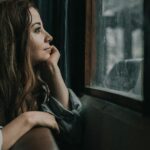 person reflecting quiet determination