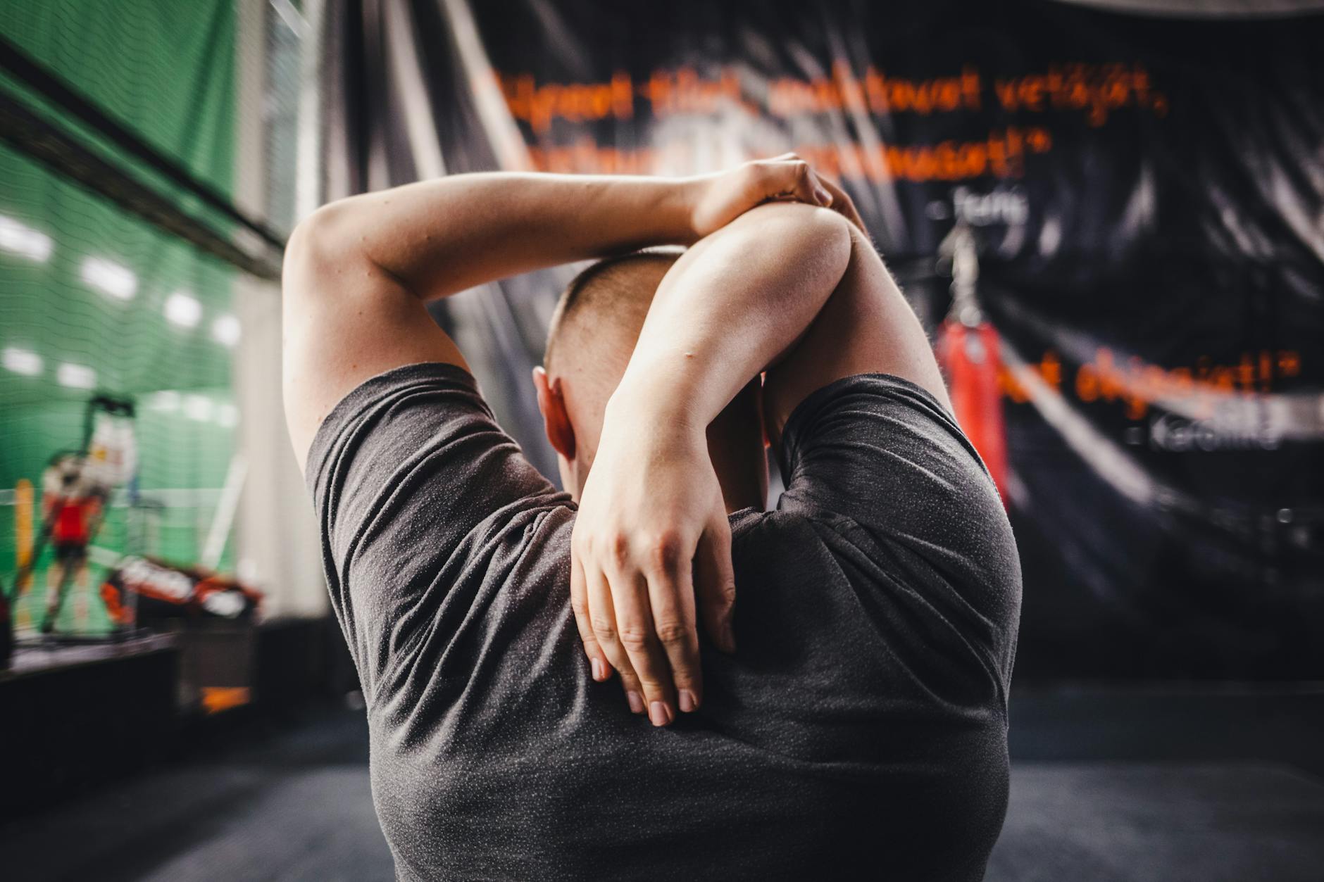 person stretching morning sun