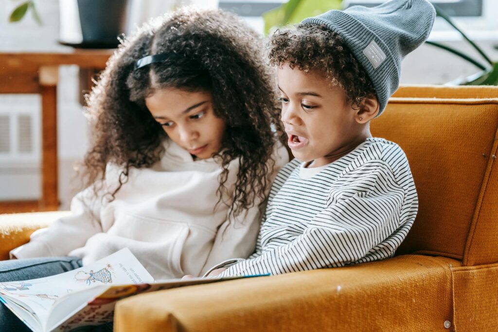 children reading biography book