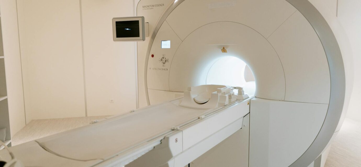 radiology tech working with equipment