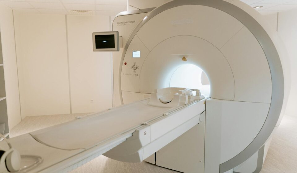 radiology tech working with equipment