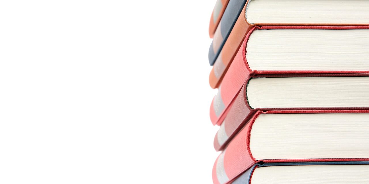 stack of biography books