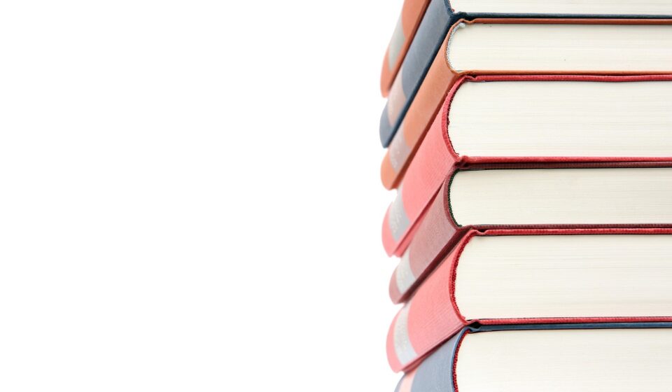 stack of biography books